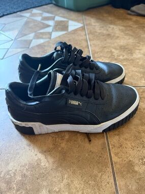 Puma Black Leather Platform Sneakers with White Sole and Gold Logo